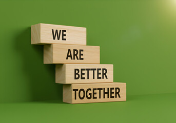 We are better together wooden blocks on green background teamwork collaboration unity partnership concept