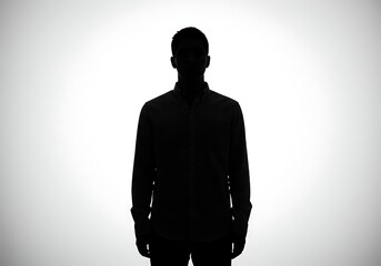 Silhouette of a man standing isolated on white background