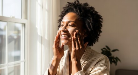 Woman enjoying morning sunlight indoors