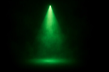 Green spotlight beam in dark background with foggy haze and isolated light source