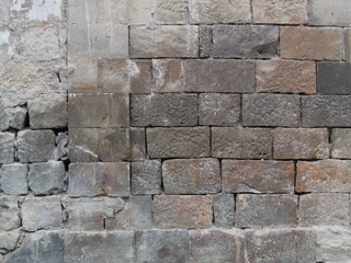 Old stone wall with textured masonry blocks. Can be used as elements or background for design projects. 