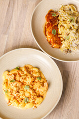 Delicious pasta dishes served in elegant plates at a cozy restaurant setting