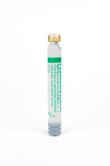 Dental Anesthetic Glass Cartridge for Injection, Close-up of a dental anesthetic cartridge in a sealed glass container.