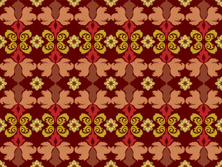 A seamless floral pattern featuring symmetrical, ornate leaves and flowers in shades of brown, red, and olive green on a maroon background.