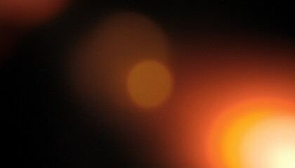 grainy colorful warm orange light leaks on black background with dust texture abstract damaged scratched retro film analog effect for using over photos as overlay or screen filter