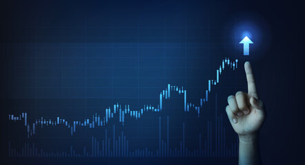 Hand indicating growth on a stock chart with a clear upward arrow, representing success and financial growth.