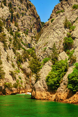 Green Canyon. Natural beauty of Turkey. Summer landscape with mountains and forest, turquoise lake. Beautiful mountain lake between rocks. Summer holiday adn trawel.
