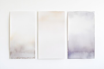 Three abstract watercolor panels.  Soft, muted tones of beige, tan, and gray.  Watercolor washes create subtle color gradients across the canvases.  Blank, ready for design