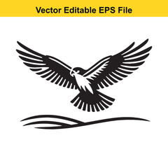 Obraz premium Majestic Black Hawk Soaring Above Ocean Waves