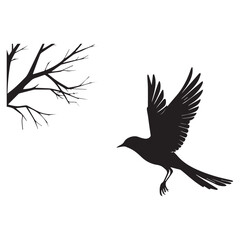 Fototapeta premium Silhouette of a bird taking flight near a bare branch