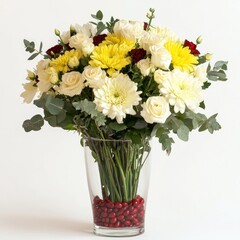 Elegant bouquet of white, yellow, and red flowers in a clear vase