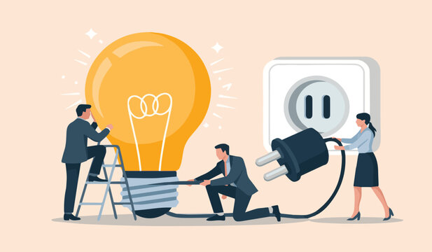 Business team powering up an idea: Collaborating to connect a giant light bulb, symbolizing innovation and problem-solving.

