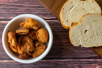 Traditional hungarian pork cracklings - crispy fired of rendered pork fat