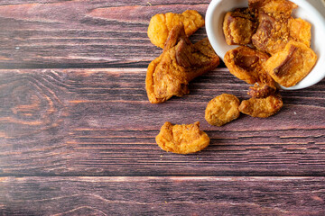 Traditional hungarian pork cracklings - crispy fired of rendered pork fat