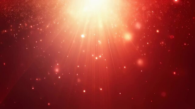 Radiant red light burst with sparkling particles in motion