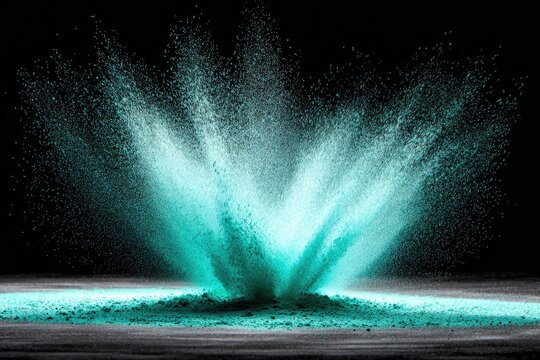 Teal powder explosion on a dark background