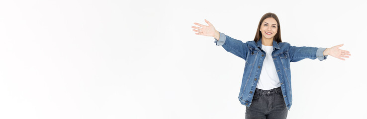 Portrait of a happy young girl with outstretched hands to embrace you isolated on a white background. Woman wants to hug you.