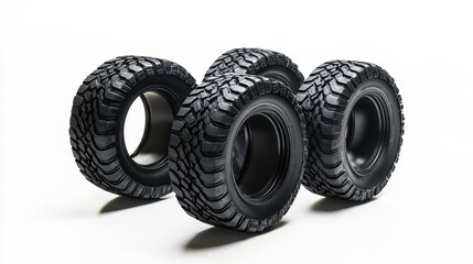 Four off-road tires standing on white background