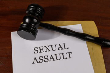 Sexual Assault Title on Legal Documents Set on Desk – Legal Concept