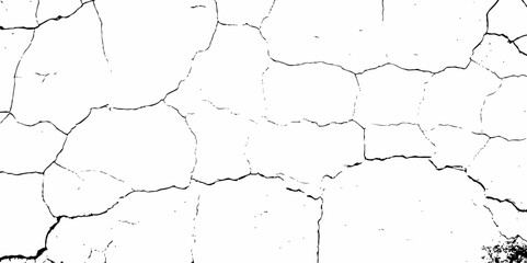 high contrast image showing a cracked white surface, creating a distressed and textured abstract pattern design element
