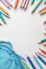 Fototapeta premium Colorful pencils and a light blue backpack on a white background