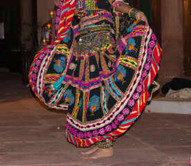 Beautiful Lehenga Skirt Movement During Kalbelia Dance by Rajasthani Dancer on stage during a performance. Rajasthan Tour concept. exploring local attractions in rural settings