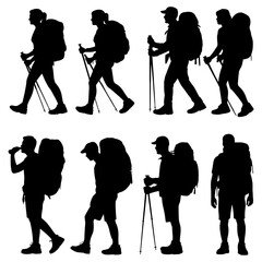 Obraz premium Silhouettes of hikers with backpacks and poles
