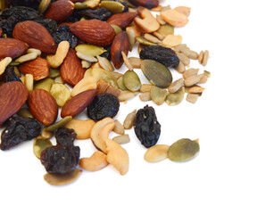 Mix nuts, dry fruits and grapes on a white background