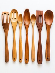 collection of wooden kitchen utensils arranged in a row these utensils include various types of spoons and spatulas. showcasing different shapes and sizes. all made from wood. ideal for cooking and s