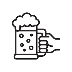 A hand holding a beer mug with frothy beer