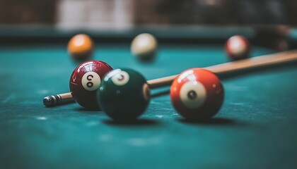 Billiard balls on green billiard table with shallow depth of field