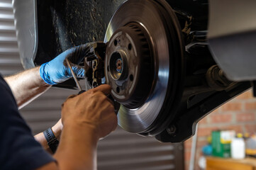 Obraz premium changing the wheel of a car