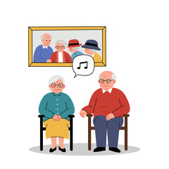 Elderly couple reminiscing about the past while sitting in chairs  