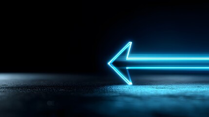 Glowing neon blue arrow pointing left on a dark surface with light trails and a black background