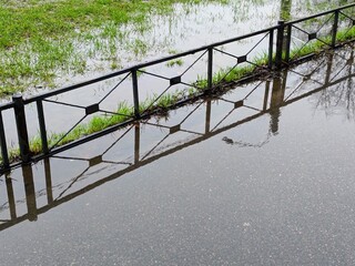flooded area after heavy rain, closeup of photo.