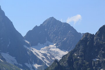 mountain peaks of elbrus region in dombai in midsummer
