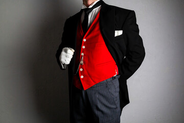 Butler or Hotel Concierge in Formal Attire Standing Elegantly. Service Industry and Professional Hospitality.