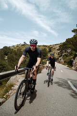 Two man riding a bike