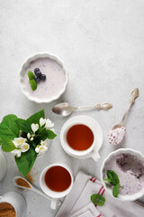 Healthy breakfast - jelly with curd and milk and berries , top view, copy space