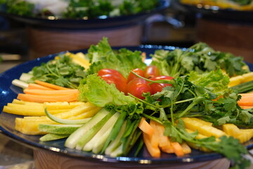 cutting vegetables on a plate different vegetables and greens for spring rolls. High quality 4k footage