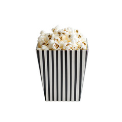 Black and white striped popcorn box filled with popcorn isolated on transparent background