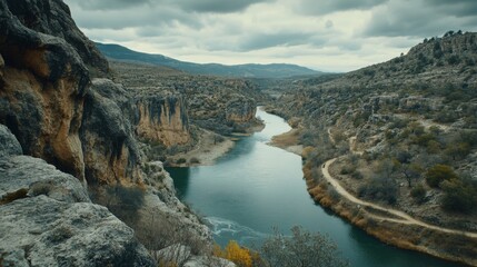 Serene River Winding Through a Rocky Canyon