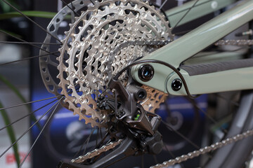 Obraz premium on rear transmission of bicycle. Racing bike cassette, precision internal thread cassette made of high-strength steel for cycling.E-bike gear.Bike parts detail.n