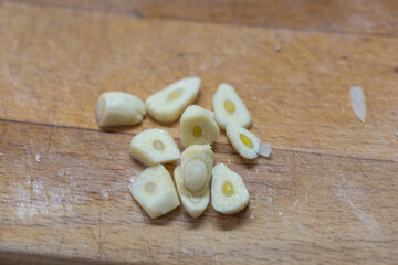 Chopped garlic on a wooden cutting board