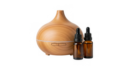 Aromatic diffuser with essential oils presented in amber bottles, creating a calm mood lighting.