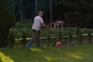 man mowing lawn