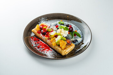 Pancakes with cottage cheese on a white table