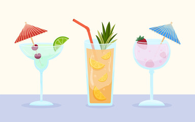 Three fruity tropical cocktails decorated with citrus, berries, and umbrellas