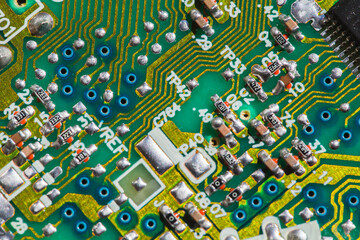 A detailed view of a green printed circuit board