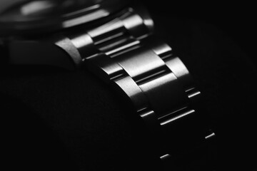 Detailed and elegant perspective of a stainless steel watch bracelet